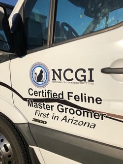 Our grooming van with new vinyl emblems.