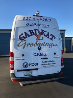 Our grooming van with new vinyl emblems.